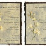 Pressed larkspur invitation with torn edges