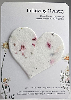 seed paper heart attached to a memorial card