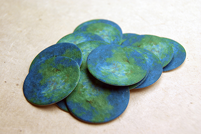 seed paper circle shapes Earth
