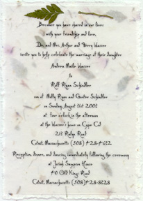 Click to order 5" x 7" Handmade invitation with vellum overlay and leather fern attachment