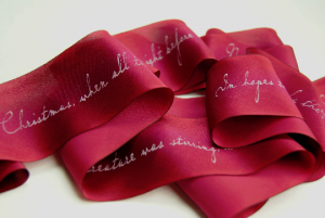 Printed silk ribbon with white lettering