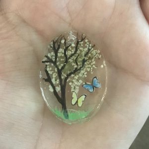 close up of botanical pendant